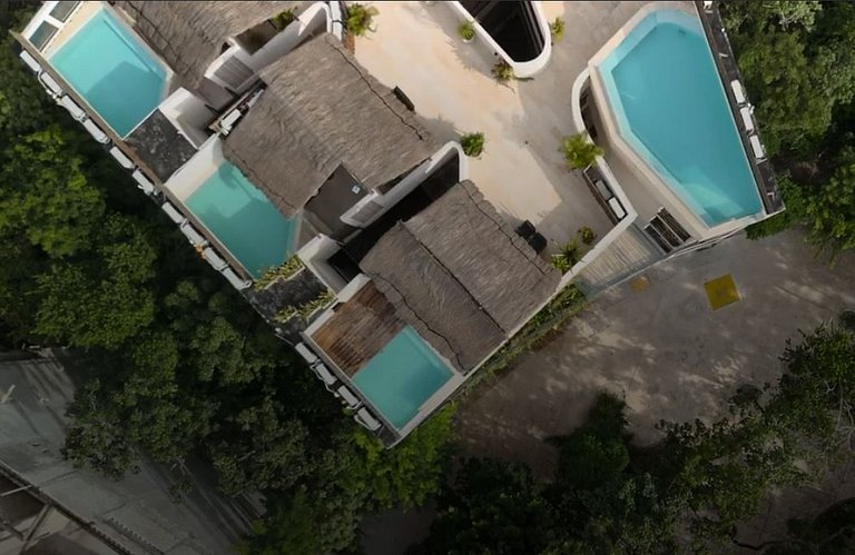 Modern building with rooftop pool and gym