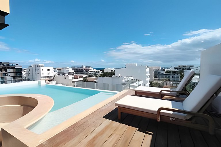 7 min plage 1 chambre Rooftop piscine jacuzzi
